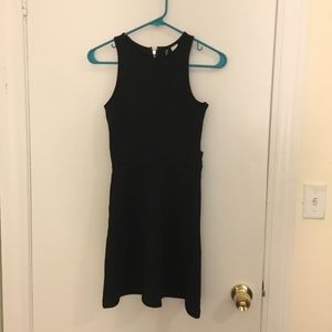Black sleeveless dress with cutouts